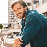 portrait-handsome-smiling-stylish-hipster-lambersexual-model_158538-17984